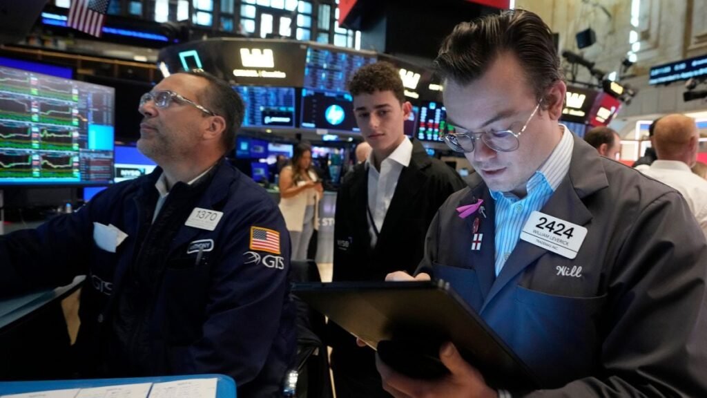 Wall Street stock indexes hover near record highs, investors focus on inflation data – Firstpost