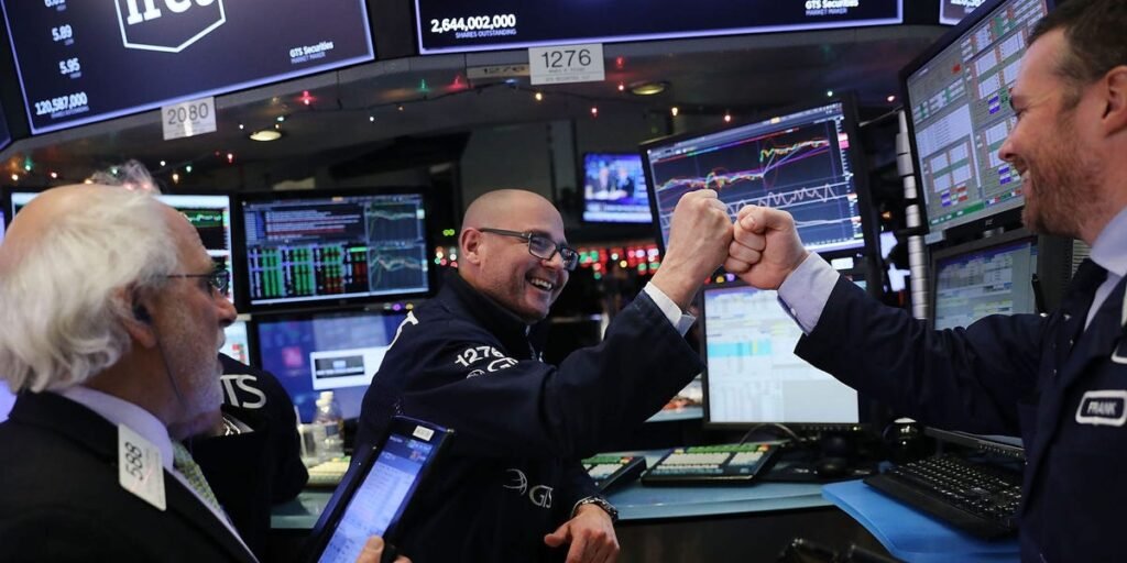 Stock market today: Fed comments and Tesla surge send stocks to new record