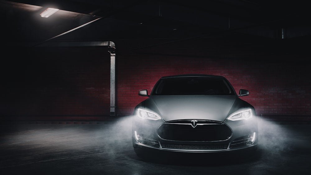 Dow Jones futures fall: Tesla shares surge ahead of Q2 deliveries, Powell speech next